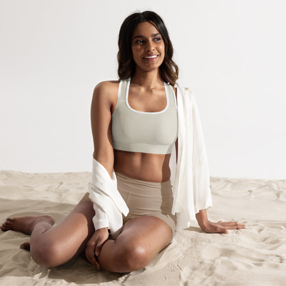 Beige Padded Sports Bra Set Do It for the Plot displayed with workout equipment and sneakers.